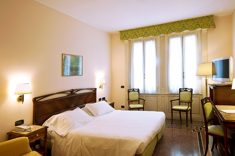 Hotel Continental Genova Номер фото